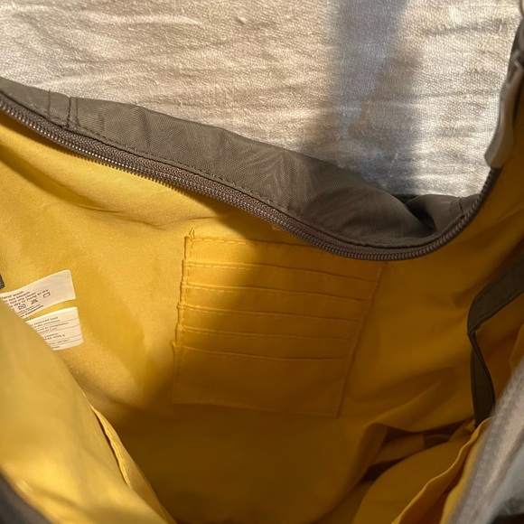 Baggallini Hobo Bag in gray. Lots of pockets. Adjustable strap. Fits lots. - Picture 4 of 6